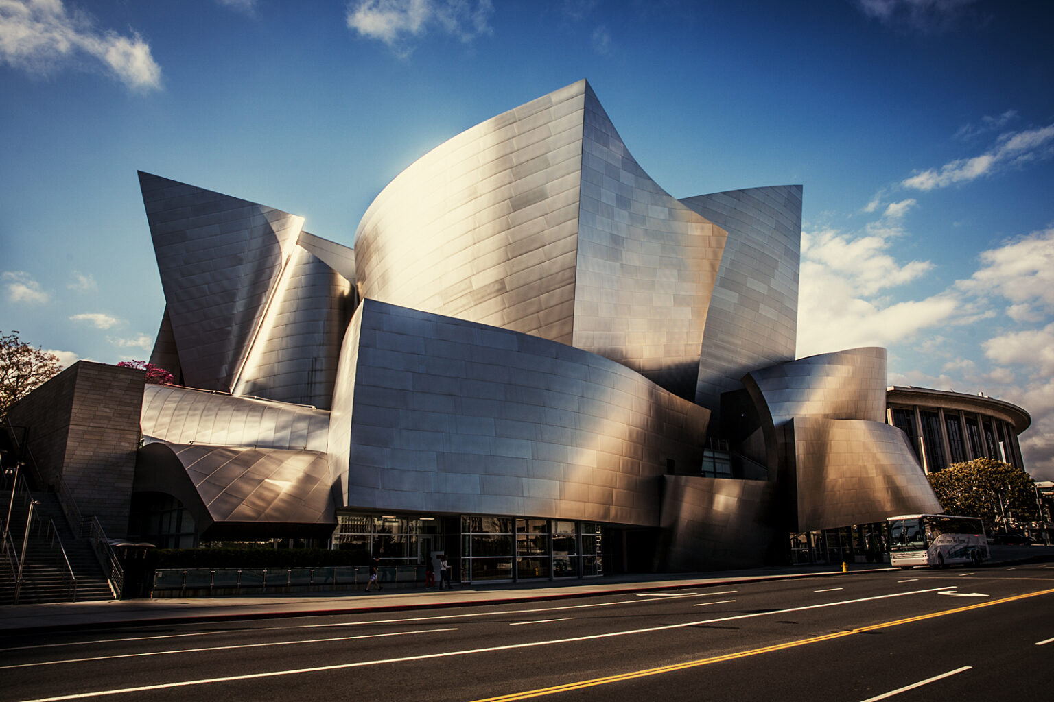 The Walt Disney Concert Hall at 111 South Grand Avenue in Downtown of Los Angeles, California, is the fourth hall of the Los Angeles Music Center and was designed by Frank Gehry. It opened on October 24, 2003. Wikipedia